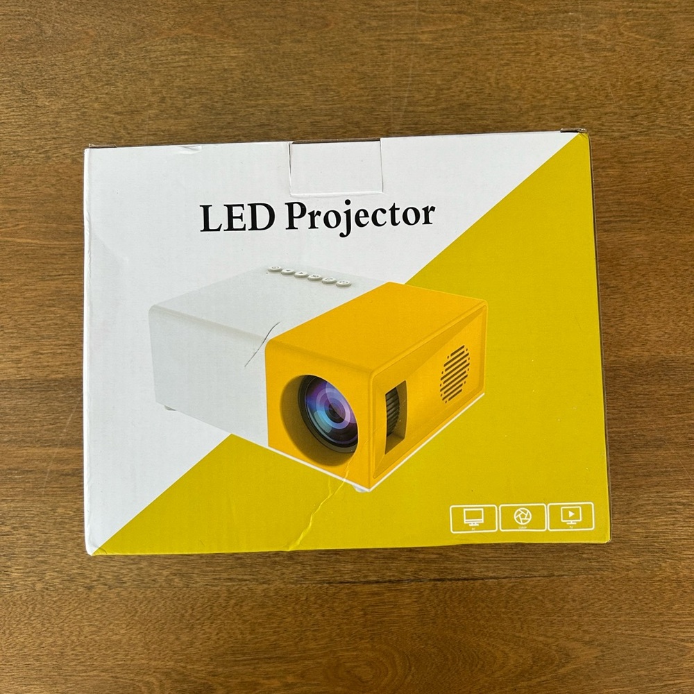 Pink LED projector for home entertainment, brand new!